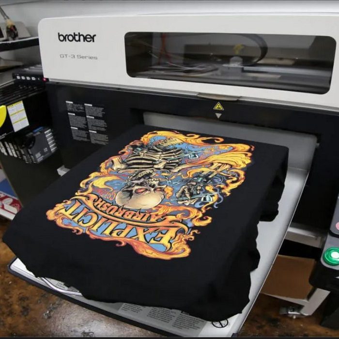 DTG Printer with black shirt and printed graphic DTG Printer with black shirt and printed graphic